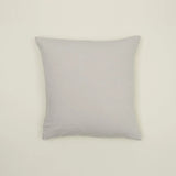 Simple light gray linen pillow, made from Belgian linen, adding casual luxury to any cozy space.
