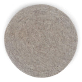Round felt wool seat cushion in soft gray, handmade from 100% New Zealand wool, ideal for extra comfort on hard surfaces.
