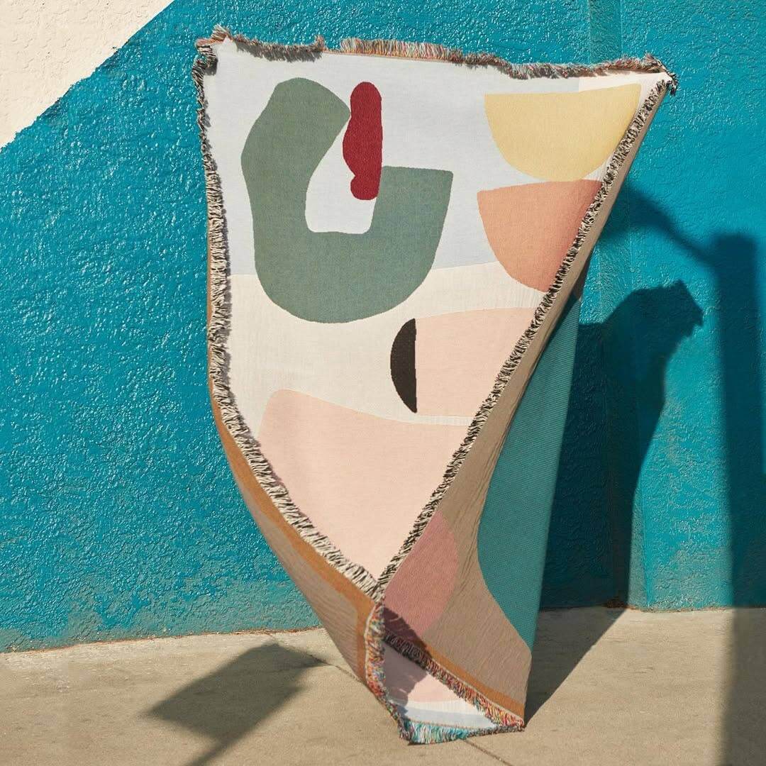 Arthur Throw by Laurie Maun featuring colorful abstract patterns, eco-friendly cotton, perfect for home decor.
