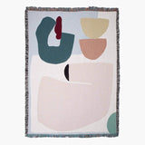 Arthur Throw designed by Laurie Maun, eco-friendly woven blanket with abstract shapes from recycled cotton.