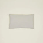 Simple light gray linen pillow, made from high-quality Belgian linen, featuring a cozy feel and oversized down insert.
