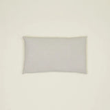 Simple light gray linen pillow, made from high-quality Belgian linen, featuring a cozy feel and oversized down insert.