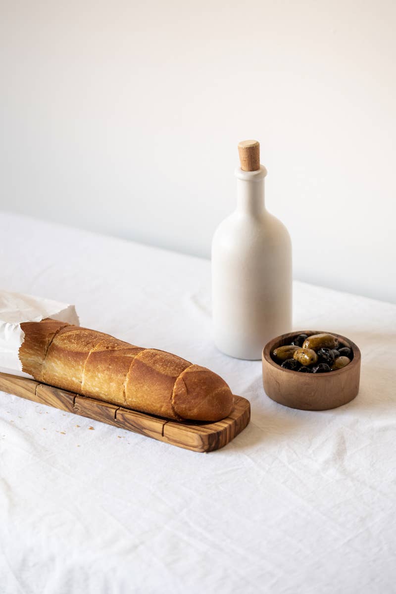 gharyan matte white stoneware bottle on table
