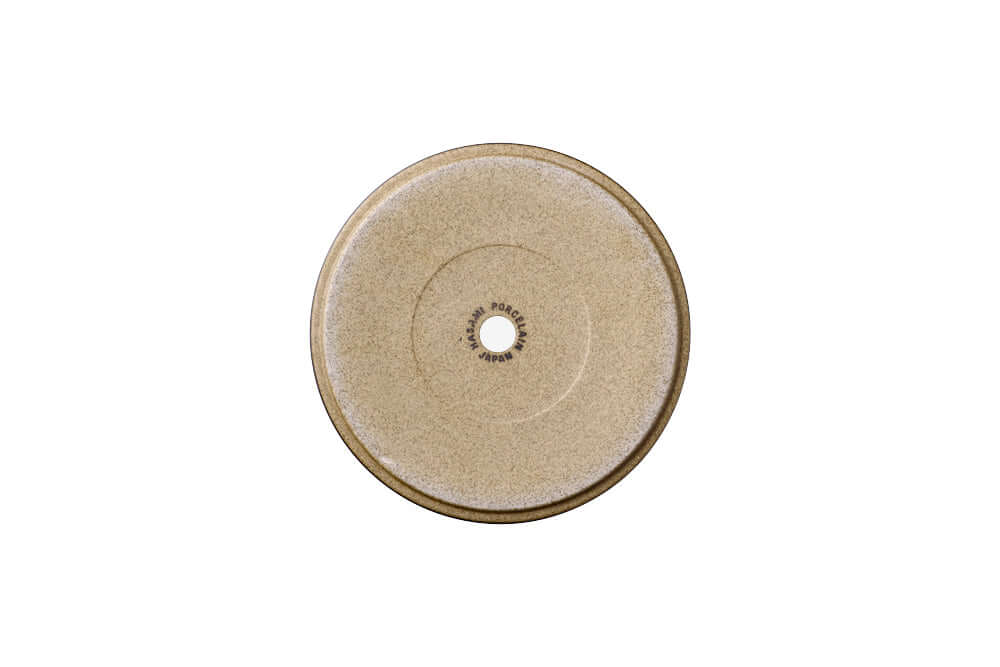 Hasami Porcelain drainage saucer in natural color, designed to complement large planters.