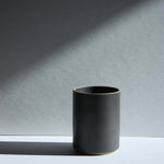 Hasami Porcelain small black planter with a modern form and tactile feel, ideal for cachepot or direct planting.