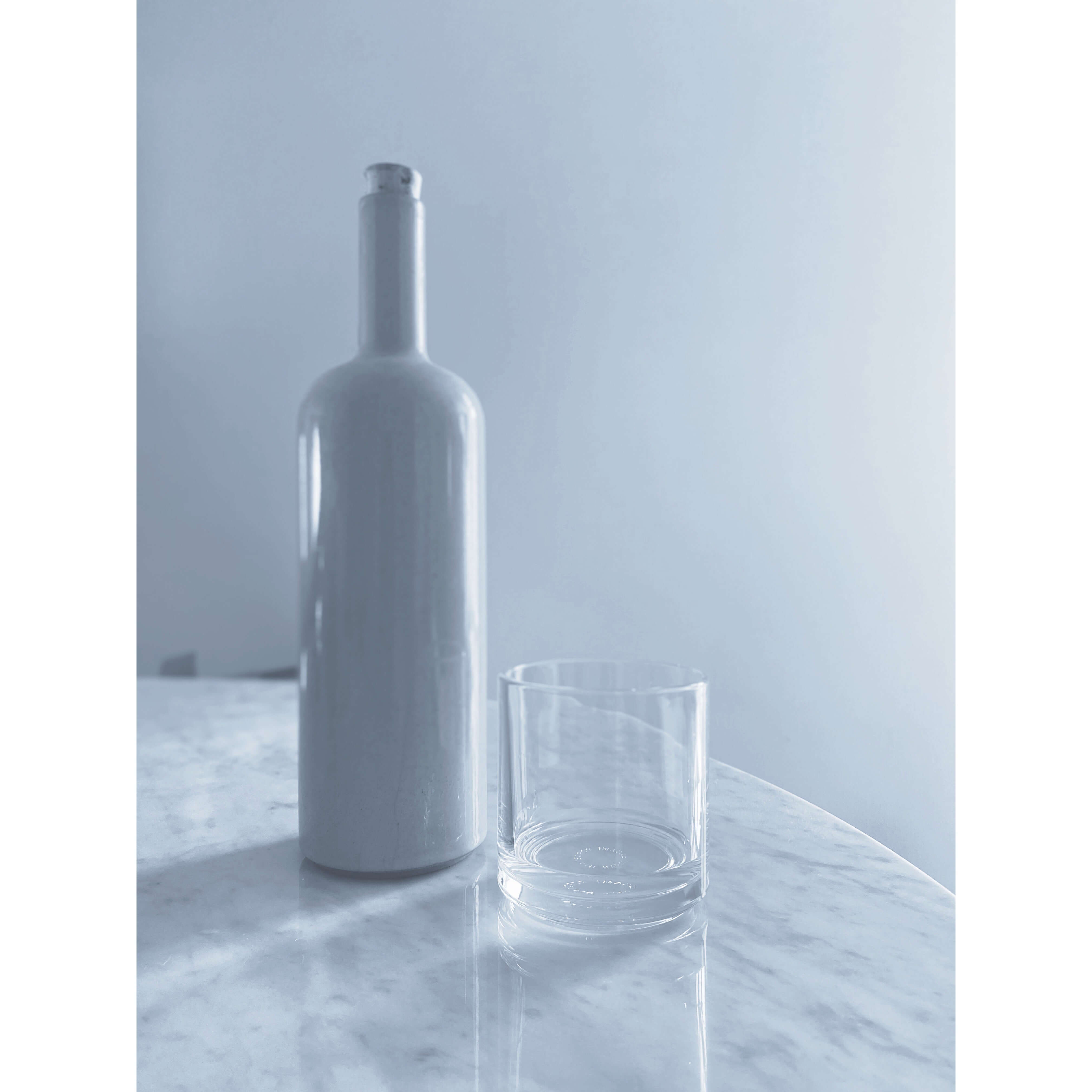 Hasami Porcelain Clear Glass Tumbler on Table with Hasami Bottle