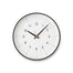 Essent Clock in white, showcasing modern design with clear numerals and stylish clock hands.
