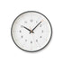 Essent Clock in white, showcasing modern design with clear numerals and stylish clock hands.