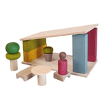 Colorful wooden toy set with various shapes and structures on a white background