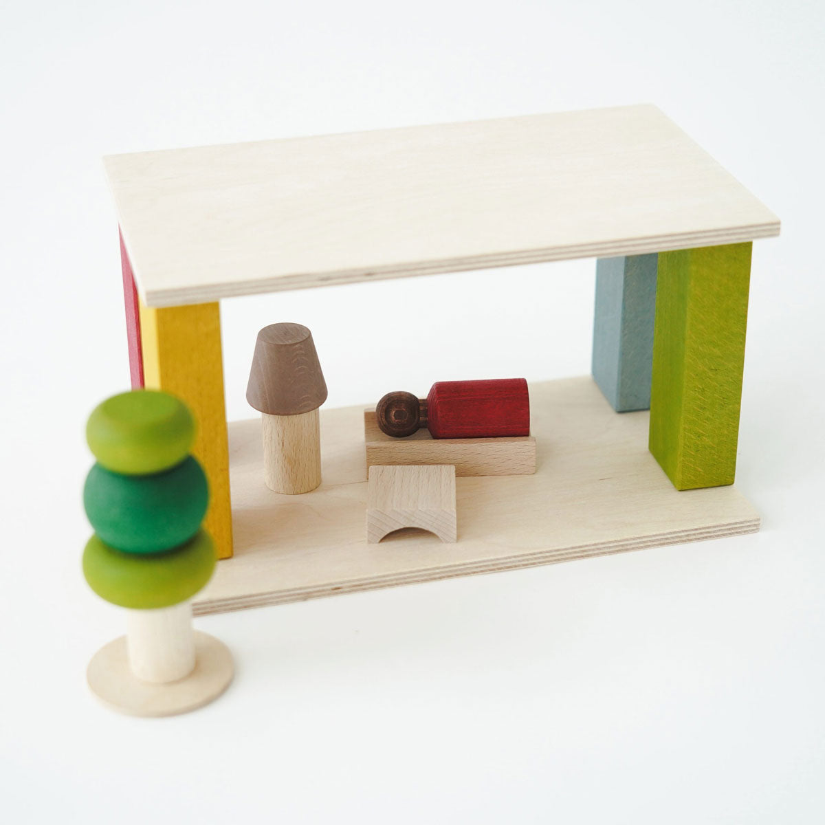 Set of wooden toys on a white surface