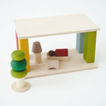 Set of wooden toys on a white surface