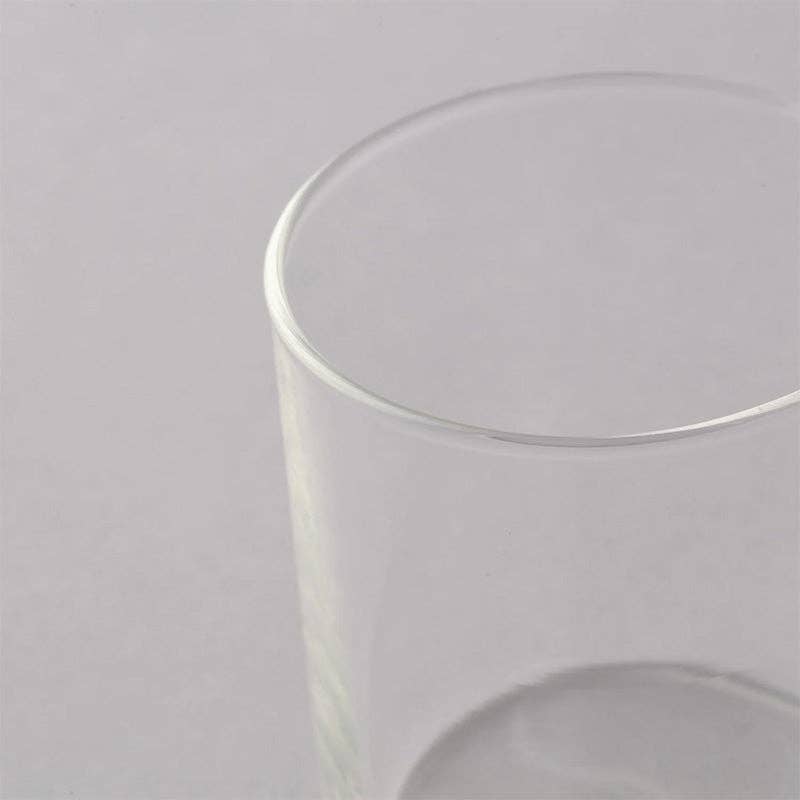 Clear glass on a light gray background