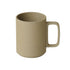 Beige mug with handle on a white background