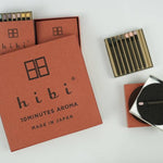 Hibi incense packaging with matches on a white background