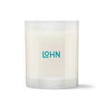 White candle with 'LOHN' logo on a white background
