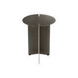 Modern round side table with a metallic finish on a white background