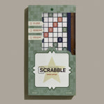 Scrabble Grand edition box with star design on a beige background