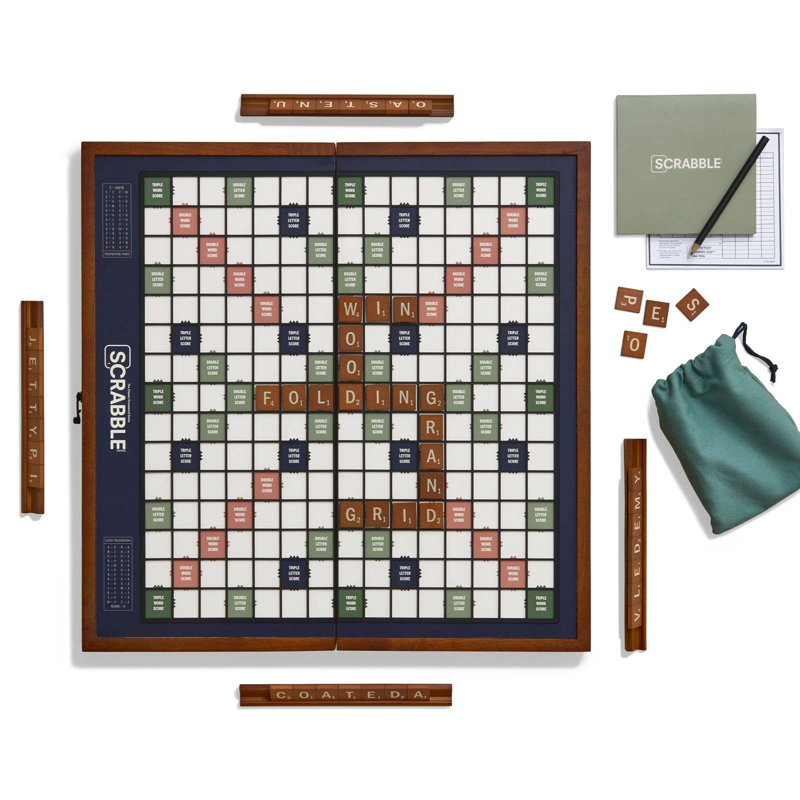 Scrabble board game set with tiles and accessories on a white background