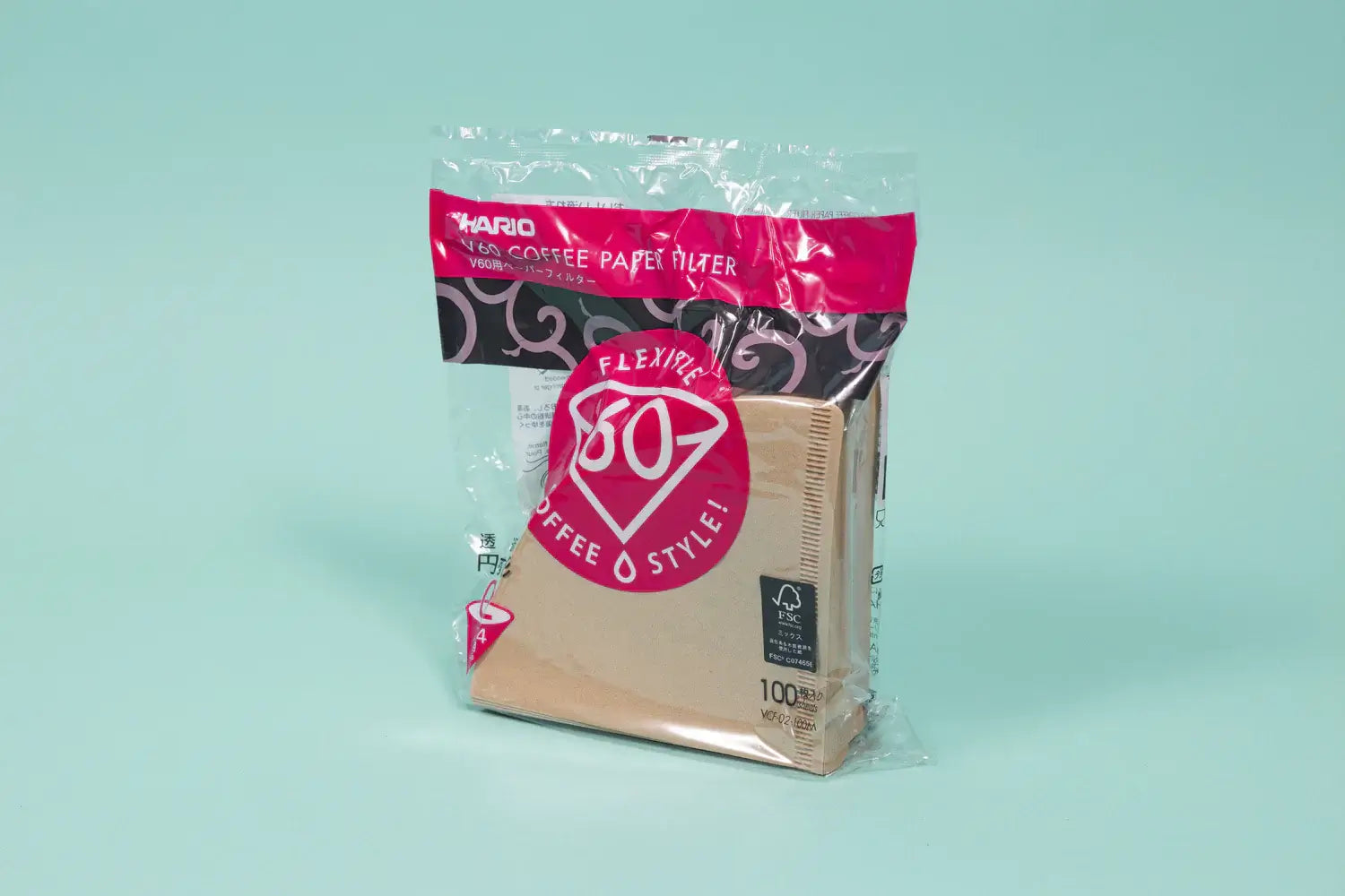 Cellophane pack of natural paper coffee filters.