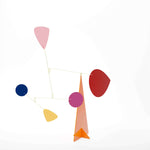 Colorful abstract sculpture with geometric shapes on a white background