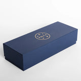 Navy blue box with gold logo on a white background