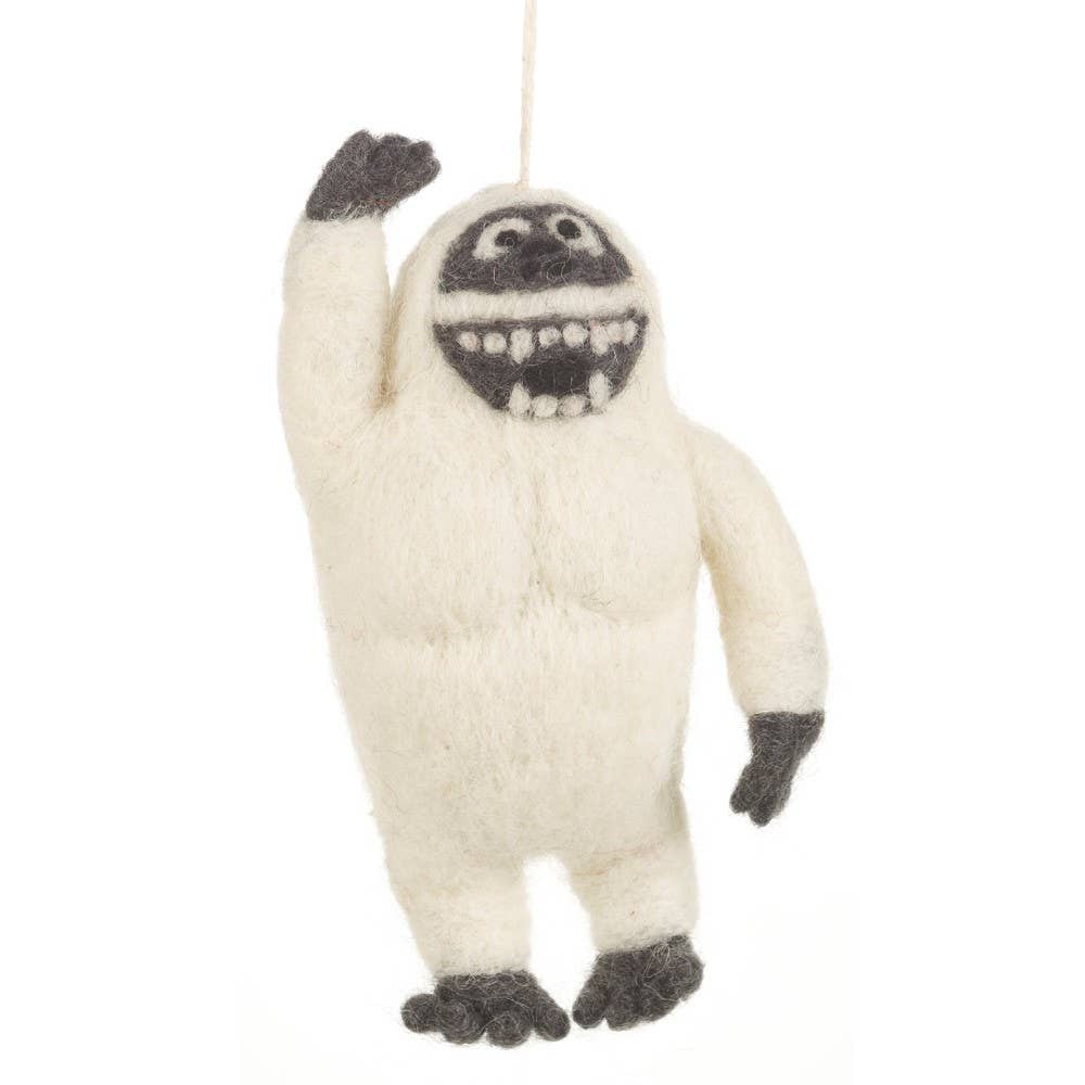 Felted wool abominable snowman ornament on a white background