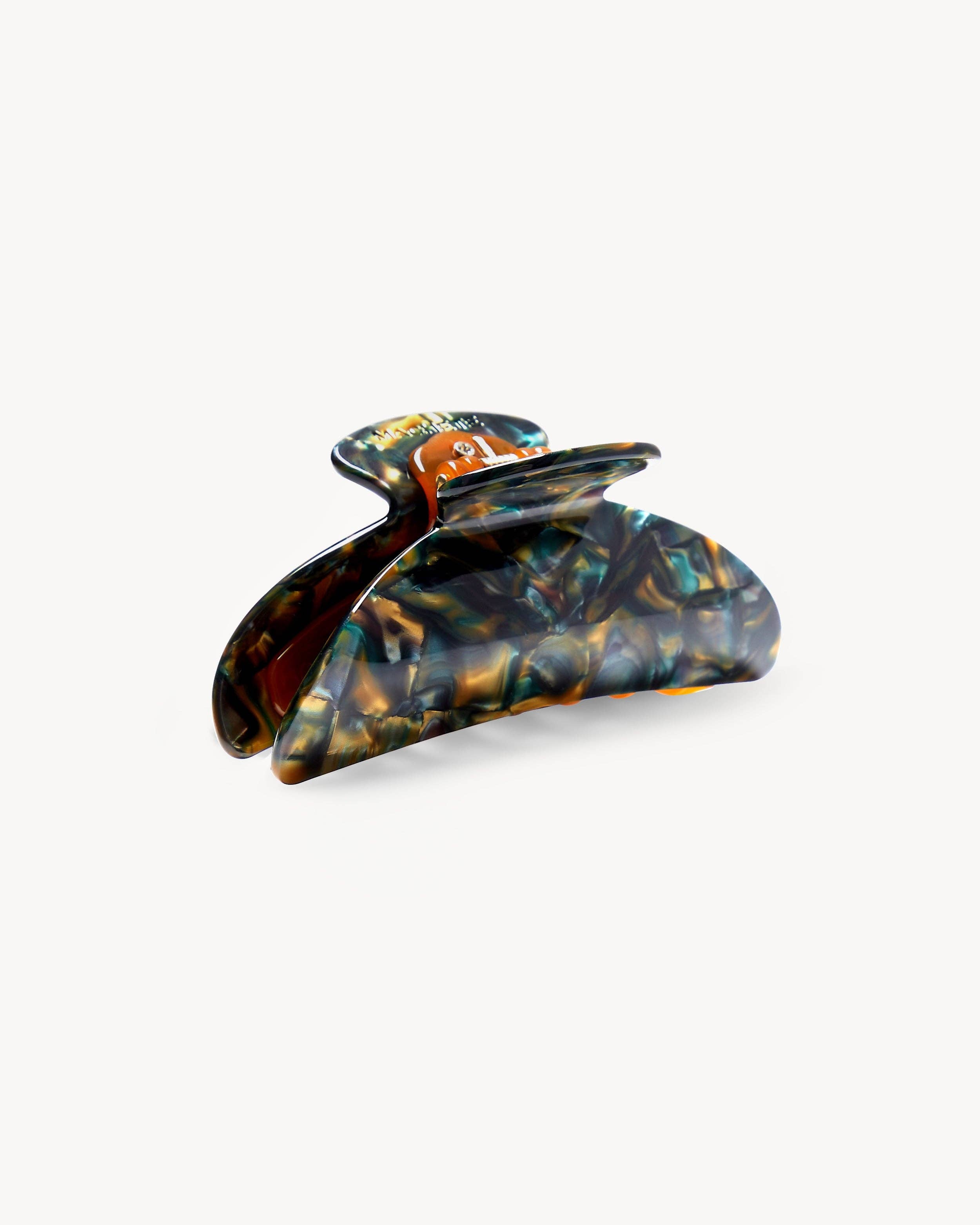 Midi Heirloom Claw in Green Tortoise, handcrafted Italian acetate hair clip for medium hair volumes.
