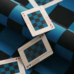 King playing card of different suits with checkered design on a blue and black checkered background