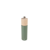 Green pepper mill with wooden top on a white background