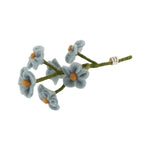 Felted flower branch with blue petals and yellow centers.