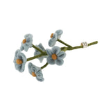 Felted flower branch with blue petals and yellow centers.