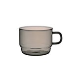 Clear grey glass mug with a handle on a white background.