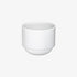 Hasami Porcelain rounded bottom tea cup in white, showcasing modern design and multifunctional features.