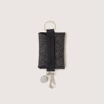 Charcoal Merino Wool Card Key Fob with silver colored Lobster Clasp, Flat Wide Keyring, and Logo Tog Tag, white background.