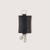 Charcoal Merino Wool Card Key Fob with silver colored Lobster Clasp, Flat Wide Keyring, and Logo Tog Tag, white background.