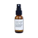 Linen spray bottle with label on a white background