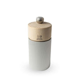 Peugeot Line salt mill featuring a metal body with a natural wood top, standing upright against a white background.