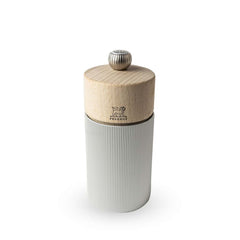Peugeot Line salt mill featuring a metal body with a natural wood top, standing upright against a white background.