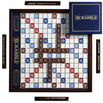 Scrabble board game with tiles and packaging on a white background