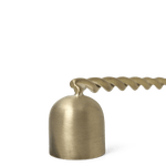 close up detail of head of brass snuffer with a twisted handle 