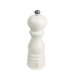 White glossy salt mill with silver top on a white background