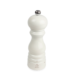 White glossy salt mill with silver top on a white background