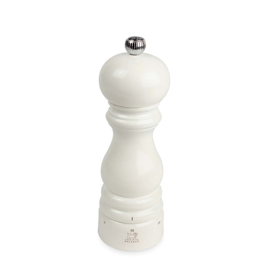 White glossy salt mill with silver top on a white background