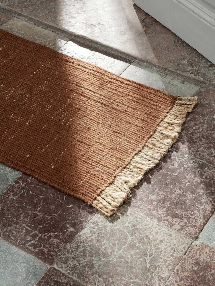 ferm living brick block mat on floor in sunlight