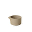 Hasami Porcelain creamer in natural color, featuring an elegant pour spout and multifunctional design.