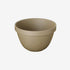 Hasami porcelain small deep round bowl in natural color, showcasing modern design and Japanese pottery tradition.