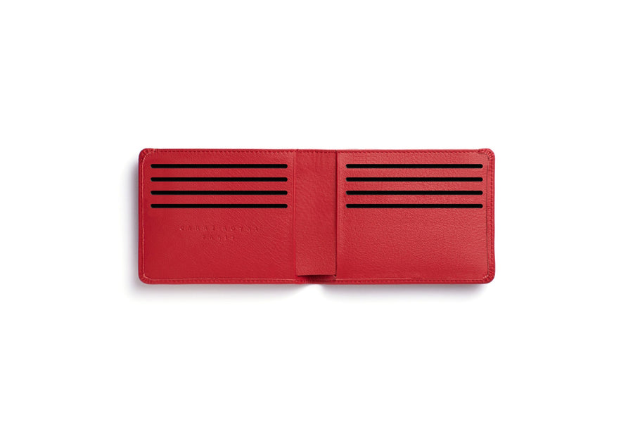 Red rectangular leather wallet unfolded with 8 card slots.